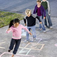 Children-Playing-Hopscotch-Outside