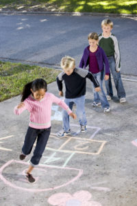 Children-Playing-Hopscotch-Outside