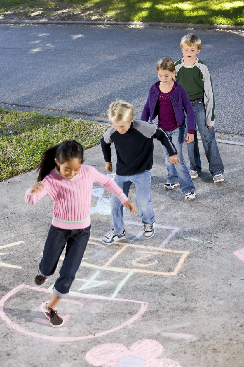Children-Playing-Hopscotch-Outside