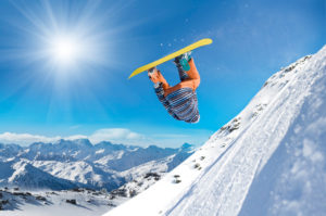 Snowboarder-flipping-through-air